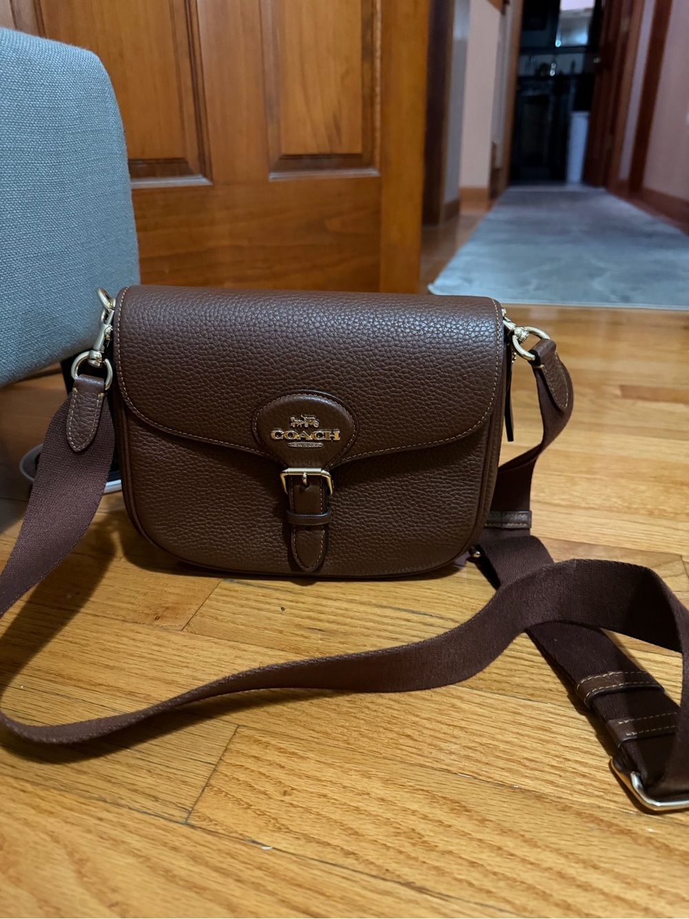 Coach Brown Pebbled Leather Saddle Crossbody with Gold Hardware